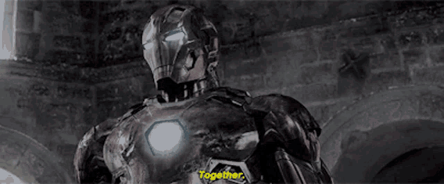 a man in an iron man suit says together in a black and white scene