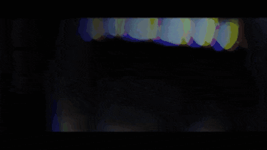 a close up of a tv screen with a glitch effect on it