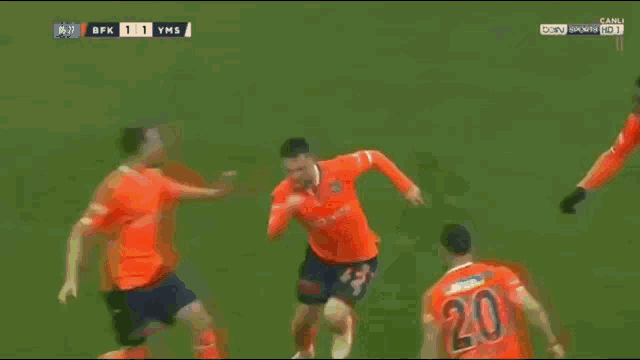 a soccer player with the number 20 on his shirt