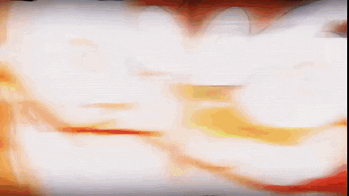 a blurred image of a person 's face with red and yellow stripes