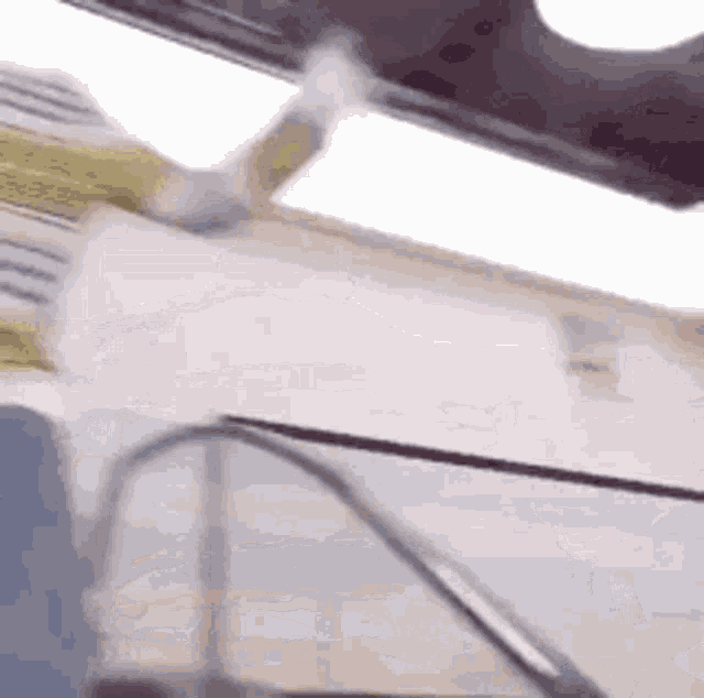 a close up of a person standing on a balcony .