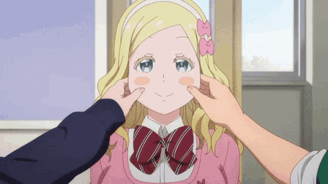 a girl with blonde hair and a pink bow in her hair is being touched by a man