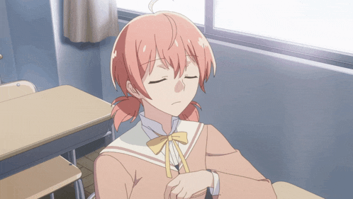 a girl with pink hair is sitting at a desk in front of a window with her eyes closed