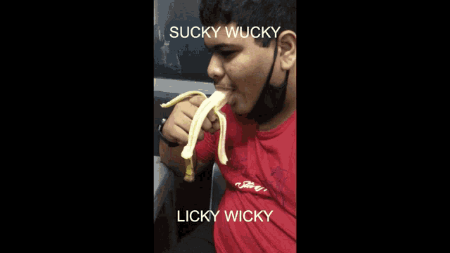 a man in a red shirt is eating a banana and the words sucky wicky and licky wicky are visible