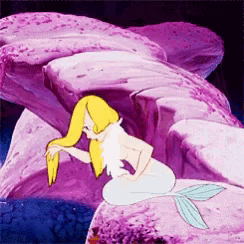a cartoon mermaid is sitting on a rock