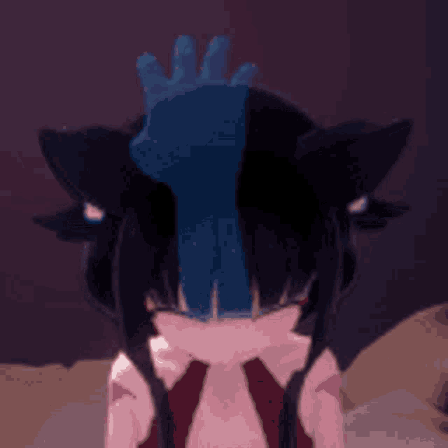 a close up of a cartoon character with a crown on her head