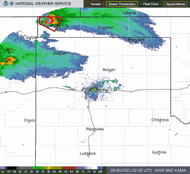 a national weather service screen shows a tornado in the distance
