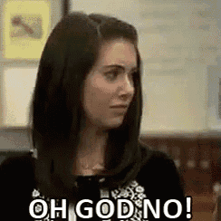 a woman is making a funny face and saying oh god no .