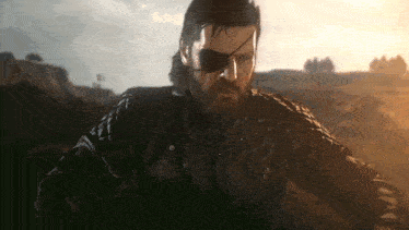 a man with a beard wearing a leather jacket and an eye patch smoking a cigarette