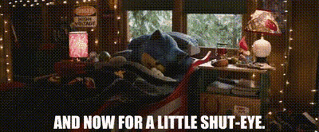 a room with a bear laying on a bed and the words and now for a little shut eye