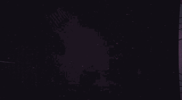 a blurry image of a person with the letter r visible
