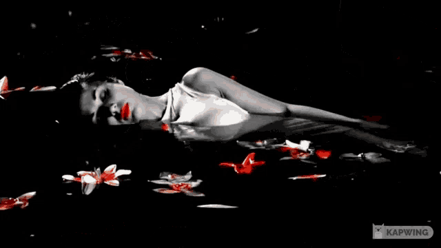 a black and white photo of a woman with red lipstick and the words karwing on the bottom