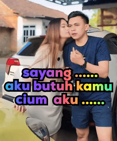 a man kissing a woman on the cheek with the words sayang aku butuh kamu cium aku below