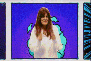 a woman in a white shirt is standing in front of a blue background with the number 30 on the bottom