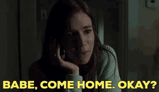 a woman talking on a cell phone with the words babe come home okay
