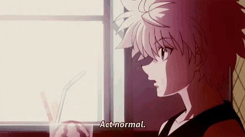 a person is drinking a drink with a straw and says act normal .