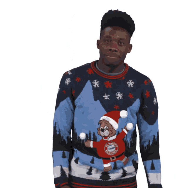 a man wearing a sweater that says bayern munich