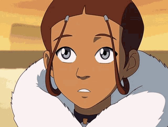 a close up of a person 's face with a fur collar