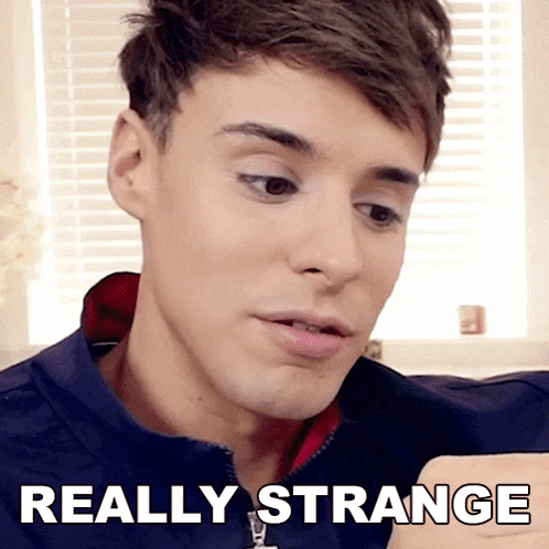a close up of a man 's face with the words " really strange " above him