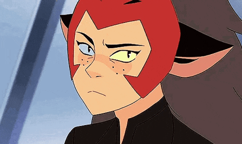 a close up of a cartoon character wearing a red mask and a black jacket .