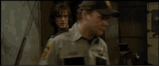 a police officer says " you 're going to need like 12 more of those " to another man
