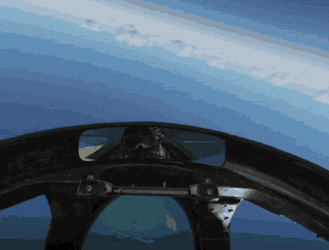 a view of the sky from inside an airplane