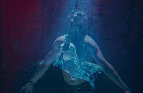 a painting of a person swimming underwater with a blue light behind them