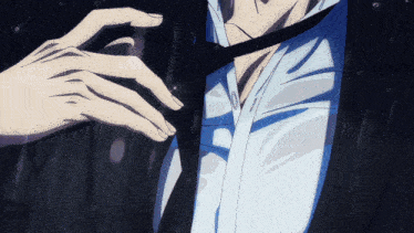 a man in a suit and tie is getting his tie tied in the rain