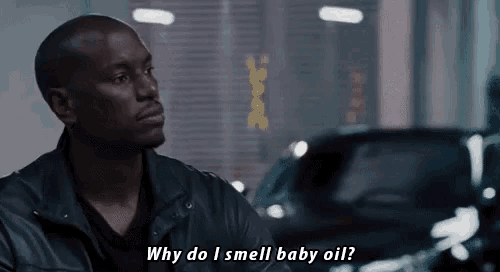a man in a leather jacket says why do i smell baby oil .