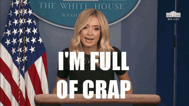 a woman stands at a podium with the words i 'm full of crap