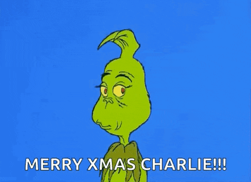 a cartoon of grinch wishing merry xmas charlie
