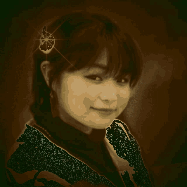 a woman with a flower in her hair has a green background