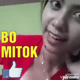 a woman is smiling and giving a thumbs up with the words bo mitok above her