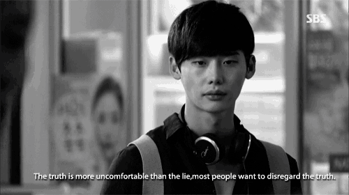 a black and white photo of a man with headphones and the words " the truth is more uncomfortable than the lie " on the bottom