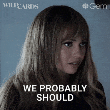 a woman says " we probably should " in front of a wildcards logo