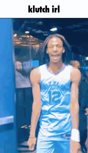 a basketball player with the number 12 on his shirt