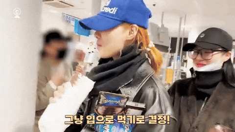 a woman in a blue hat with the word credit on it
