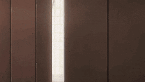 a cartoon girl with pink hair is peeking out from behind a wall