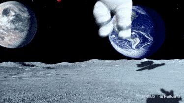 a shadow of an astronaut is cast on the moon in front of earth