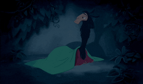 a cartoon character with a green blanket on his head