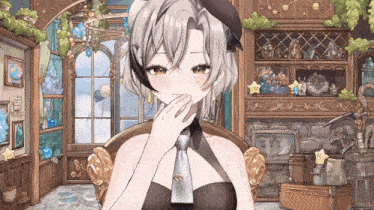 a girl with a hat and tie is sitting in a chair in a room with a fireplace .