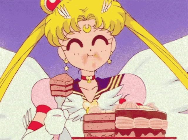 sailor moon is eating a cake with a fork .