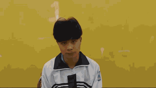 a boy with a dog and a pen on his head with the word ponk behind him