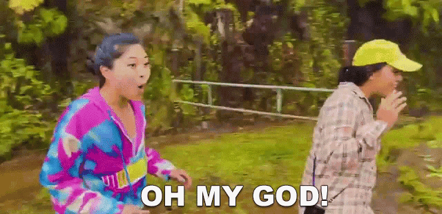 two women are running in the woods and one of them is saying oh my god !