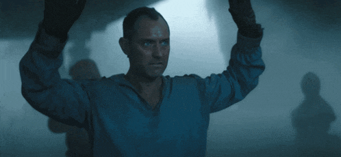 a man says " you know what just shoot me " in a dark room