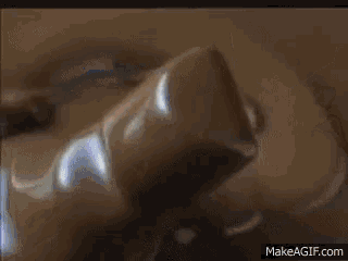 an animated image of a zeppelin flying in the sky with makeagif.com at the bottom