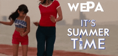 a woman and a girl are dancing on a beach with the words wepa it 's summer time behind them