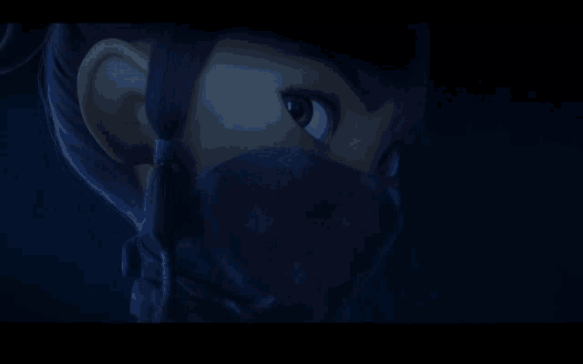 a close up of a person 's face with a mask on it