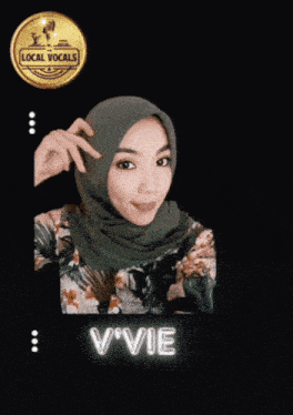 a picture of a woman with a hijab and the name v'vie