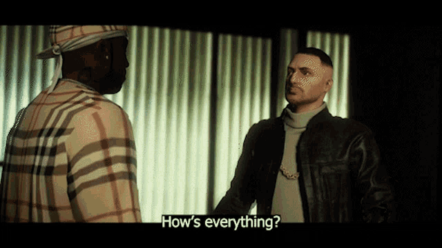 a man in a plaid shirt is talking to another man in a black jacket